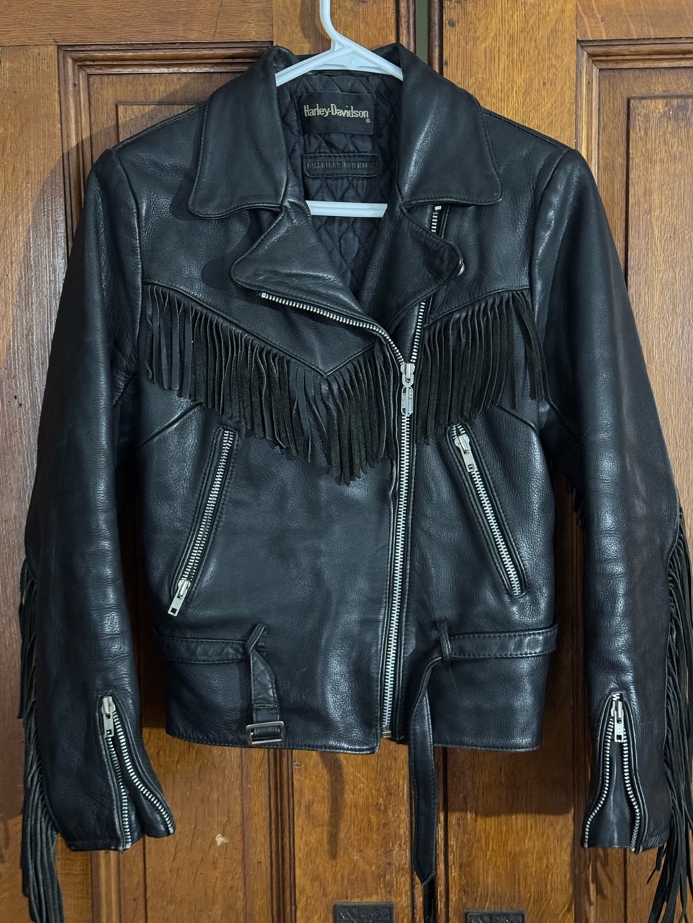 Harley Davidson Women’s black leather fringed motorcycle jacket sz36. XLNT